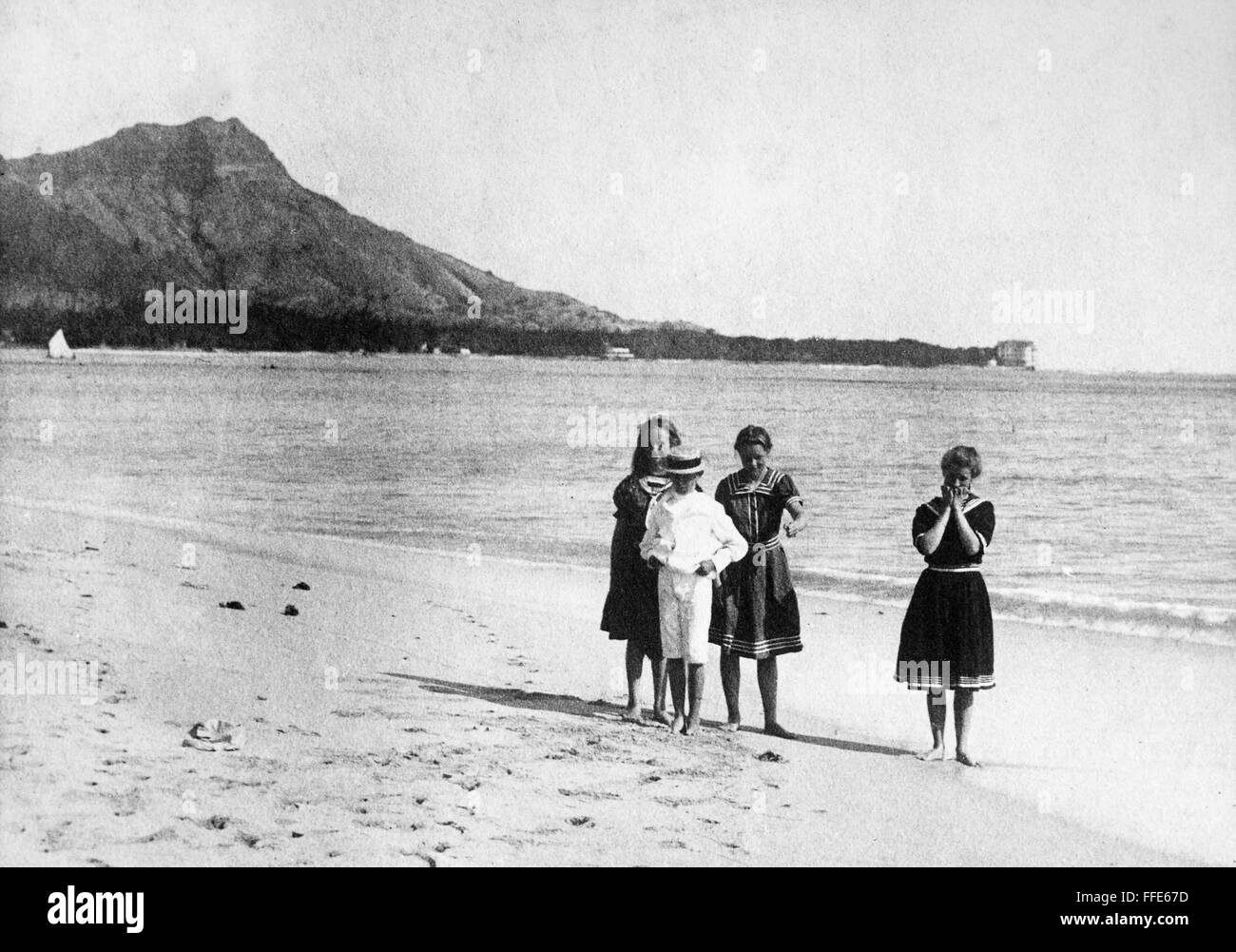 HAWAII: TOURISTS, 1905. /nBathers on Waikiki Beach at Diamond Head on Oahu, Hawaii, 1905. Stock Photo