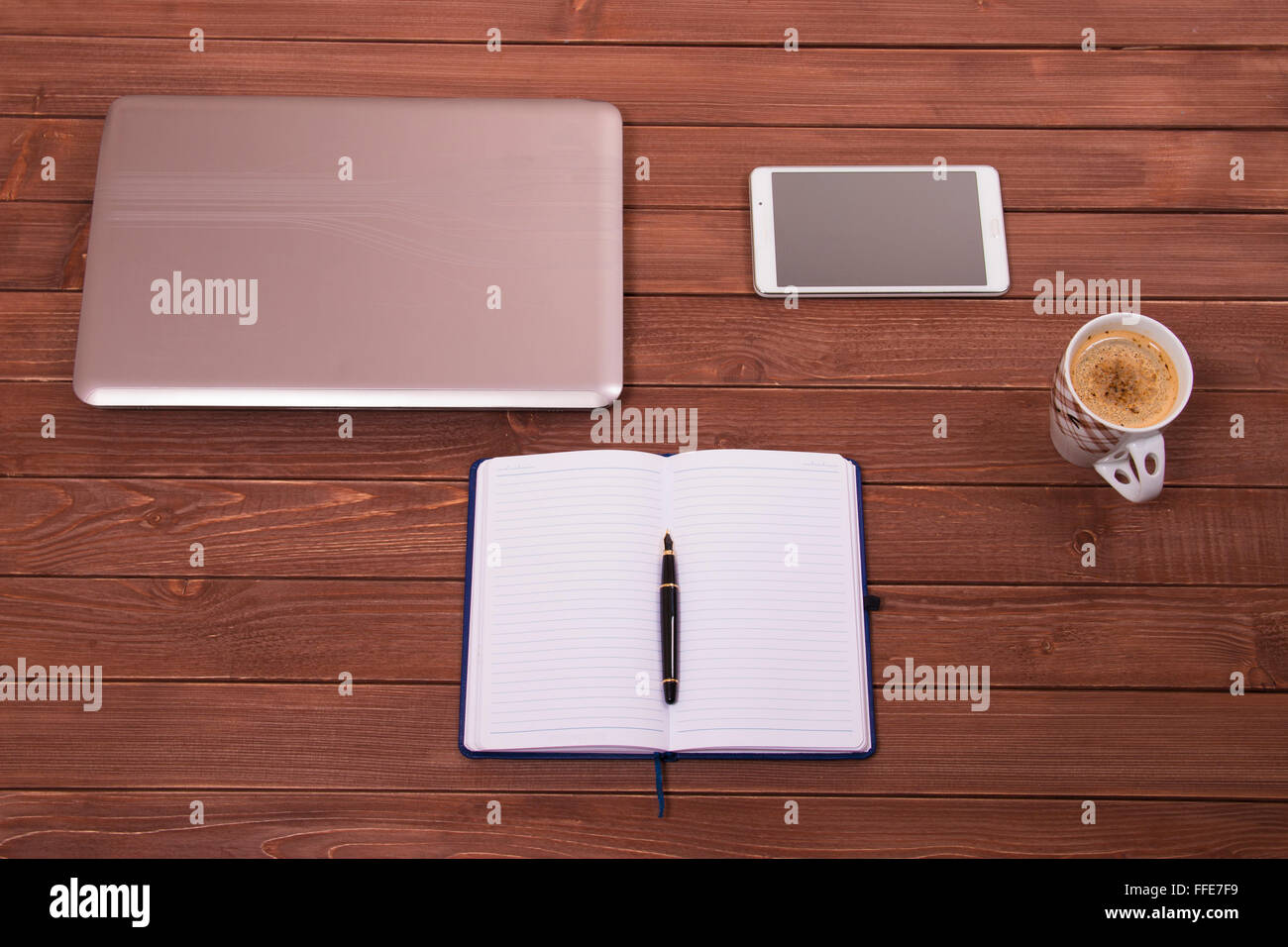 office desk and notebook Stock Photo - Alamy
