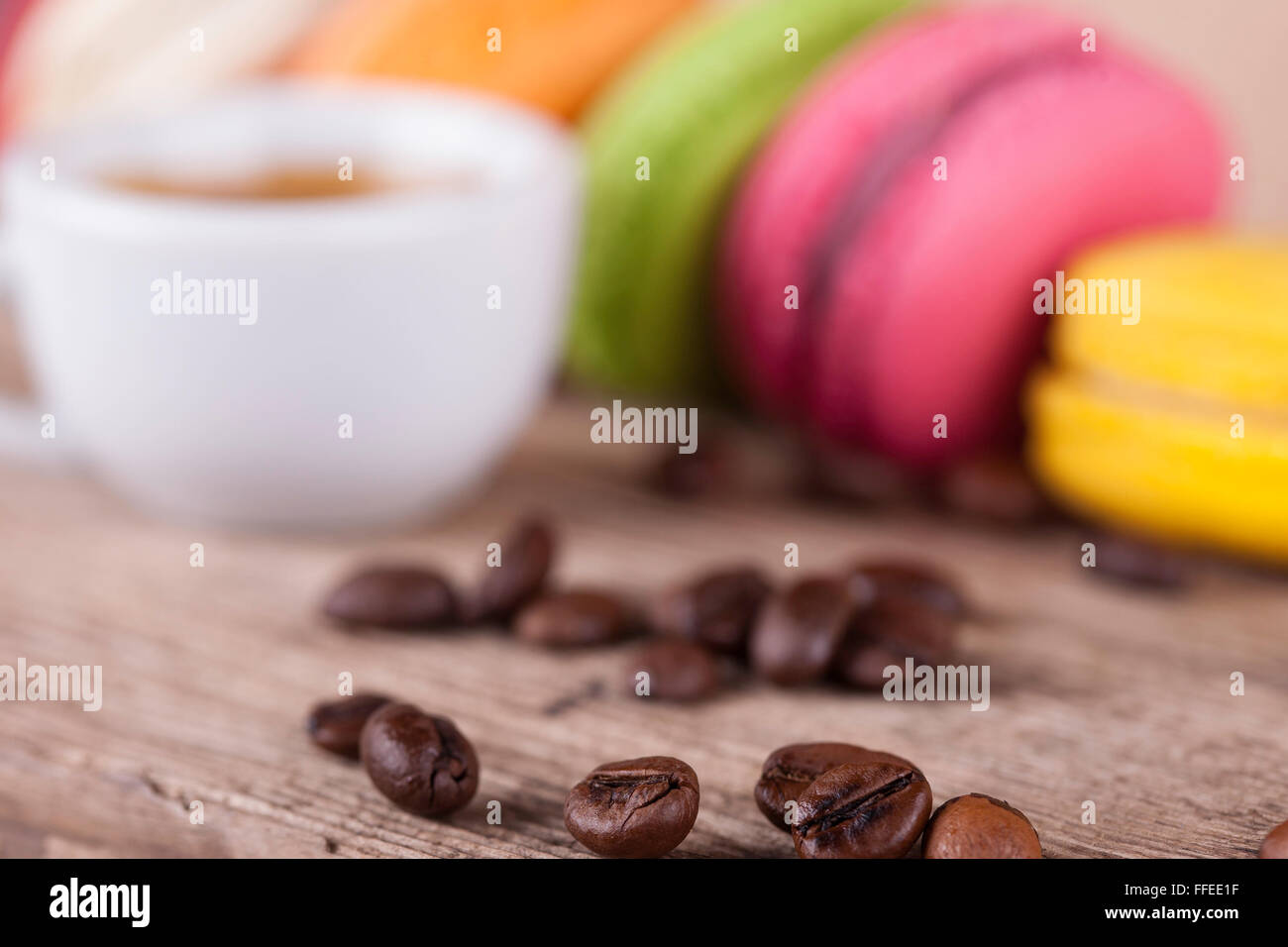 macaroons and coffee on old wooden vintage background select focus Stock Photo