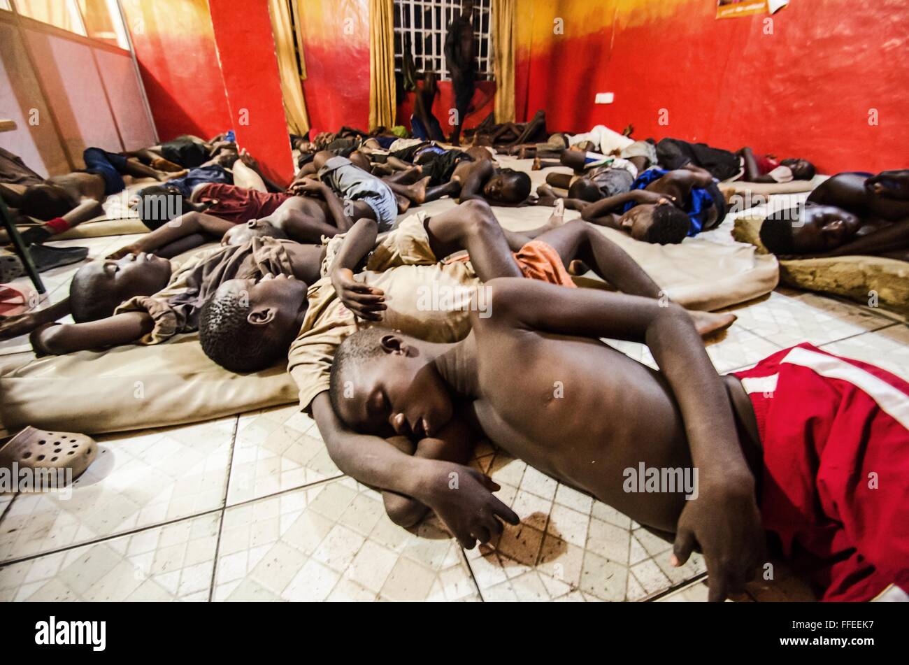 Homeless children sleep in a shelter in Freetown, Sierra Leone. Stock Photo