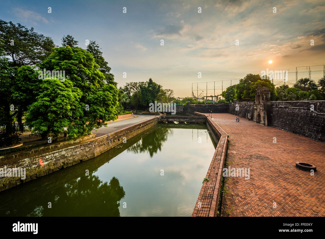 Sunset over the moat at Fort Santiago,  Intramuros, Manila, The Philippines. Stock Photo