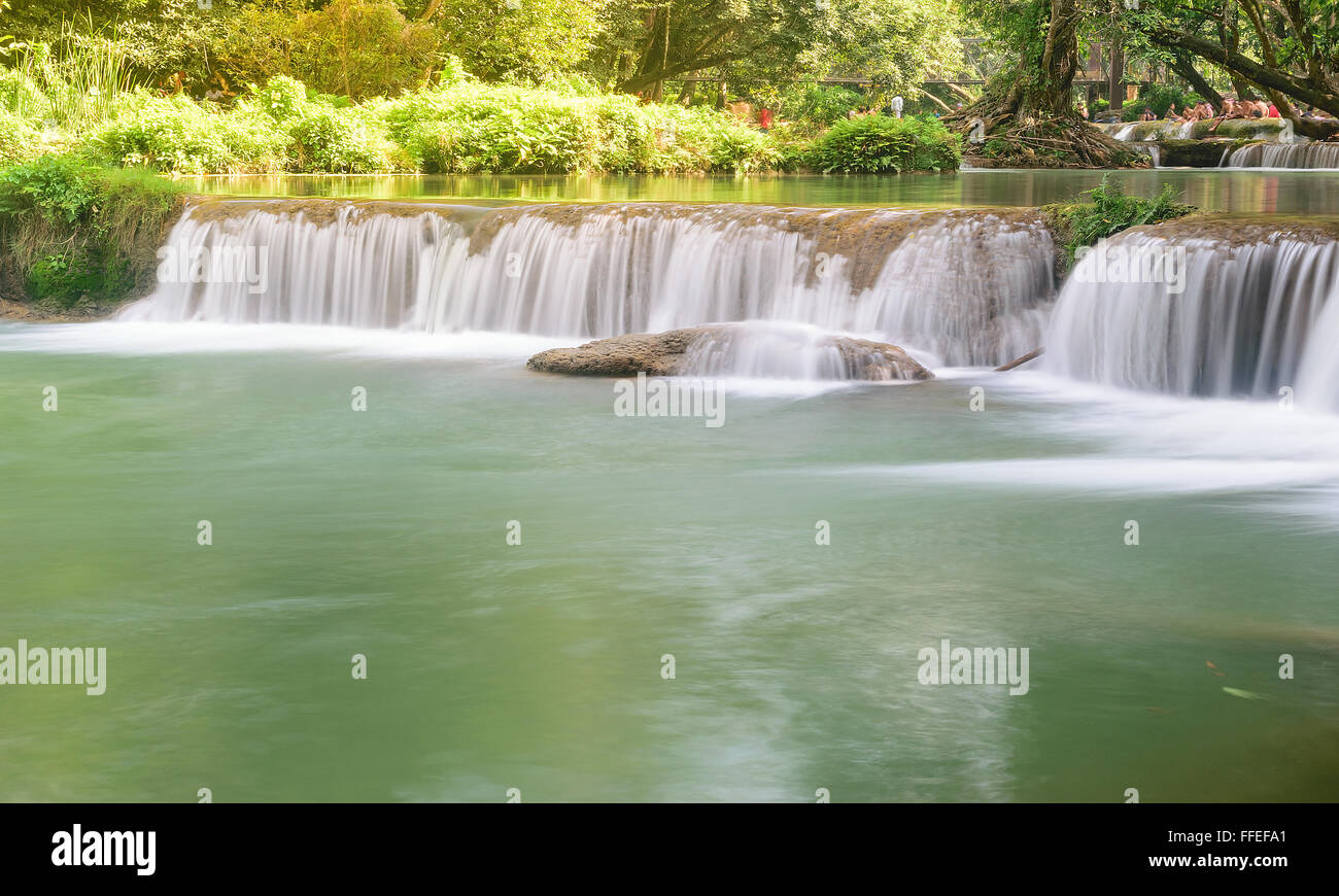 Beauty waterfall flows down from the mountains Stock Photo - Alamy