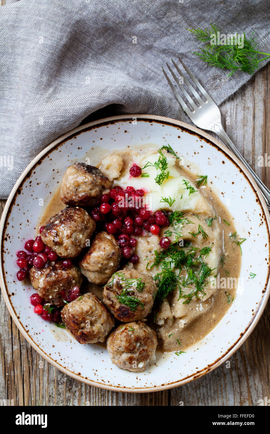 Swedish meatballs with mash potatoes and lingonberries Stock Photo