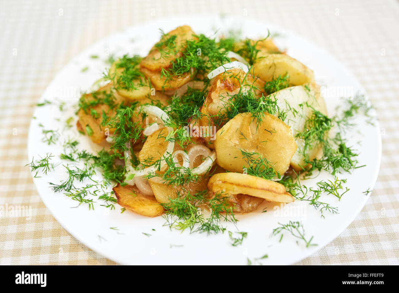 Prepared new potato with stirred butter and dill Stock Photo