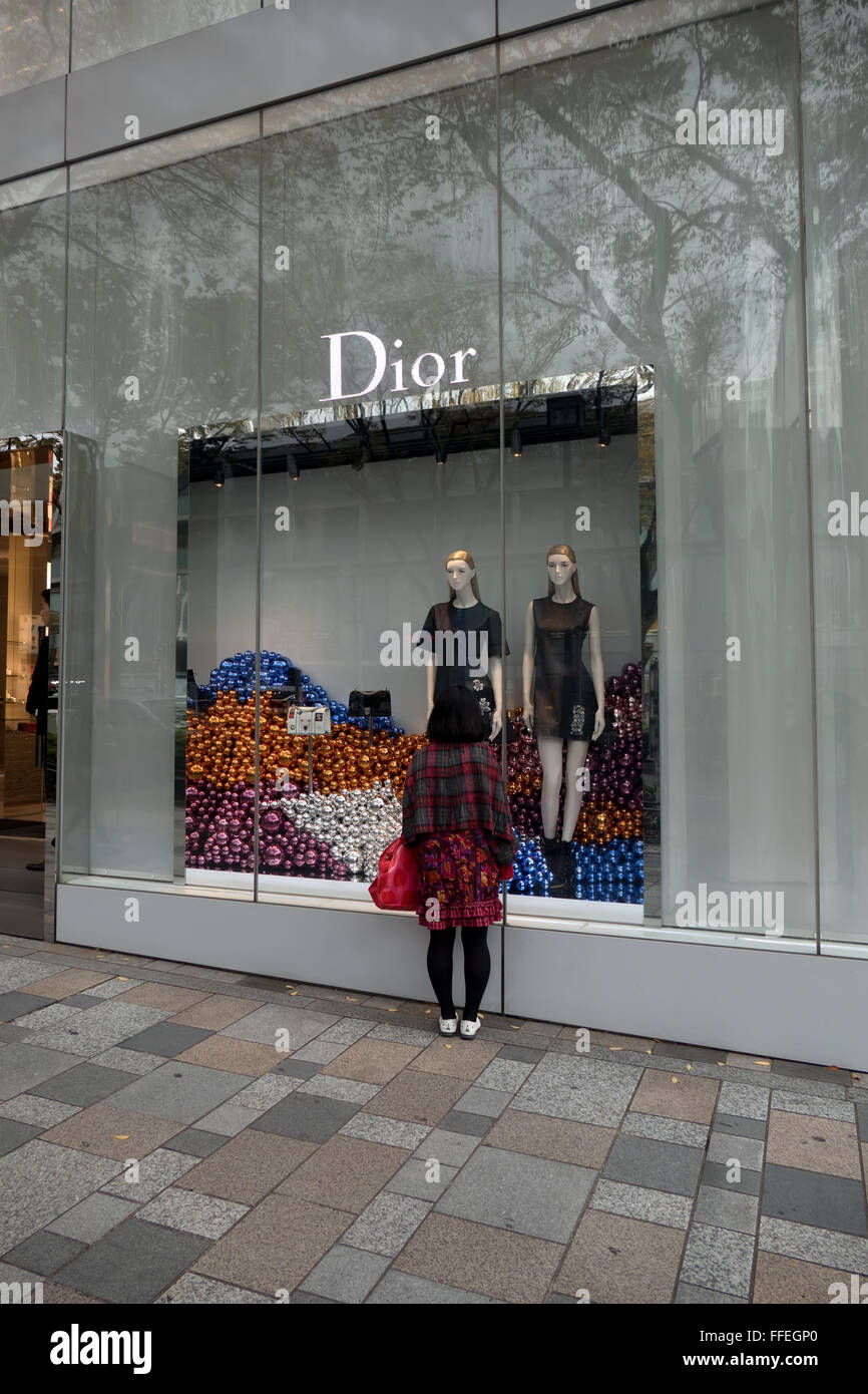 Dior, famous fashion store, shop, tourist attraction, woman shopping. Omotesando or Omote-sando, Harajuku, Tokyo, Japan, Asia Stock Photo