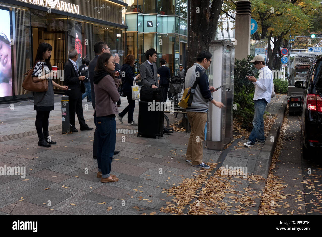 Japanese people with cigarette in the street, Asian smokers in smoking