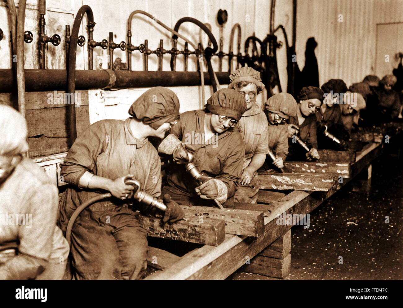 Women workers in ordnance shops, Midvale Steel and Ordnance Co., Nicetown, Pa.  Hand chipping with pneumatic hammers. Circa 1918.  Photograph by Lt. Lubbe/US Army  This archival print is available in the following sizes:  8' x 10'   $15.95 w/ FREE SHIPPING 11' x 14' $23.95 w/ FREE SHIPPING 16' x 20' $59.95 w/ FREE SHIPPING 20' x 24' $99.95 w/ FREE SHIPPING  * The American Photoarchive watermark will not appear on your print. Stock Photo