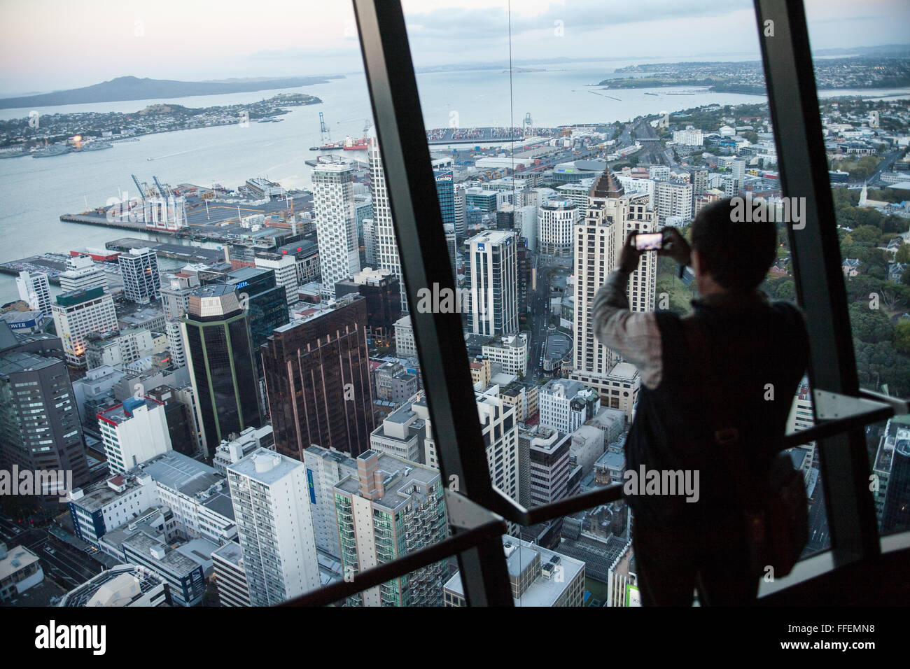 Night time,dusk,twilight view from Sky Tower of Auckland City,Port,Harbour and Rangitoto volcano Island,New Zealand Stock Photo