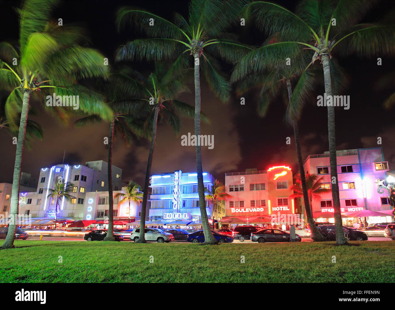 Ocean Drive and Art Deco hotels illuminated at night in Miami Beach, Florida, USA Stock Photo