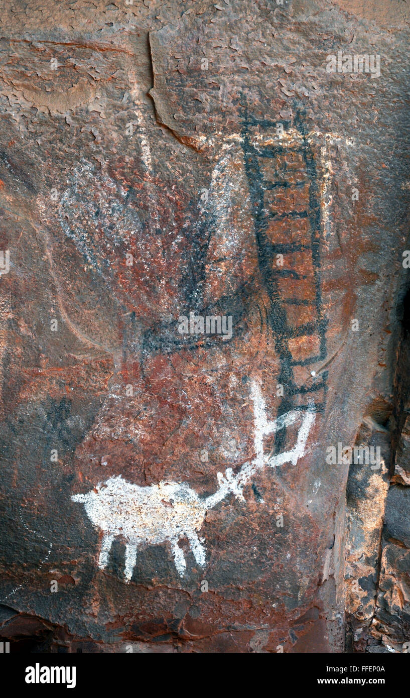 Native American Pictographs and Petroglyphs painted and carved image prehistoric rock art from Sinagua and Archaic cultures. Stock Photo