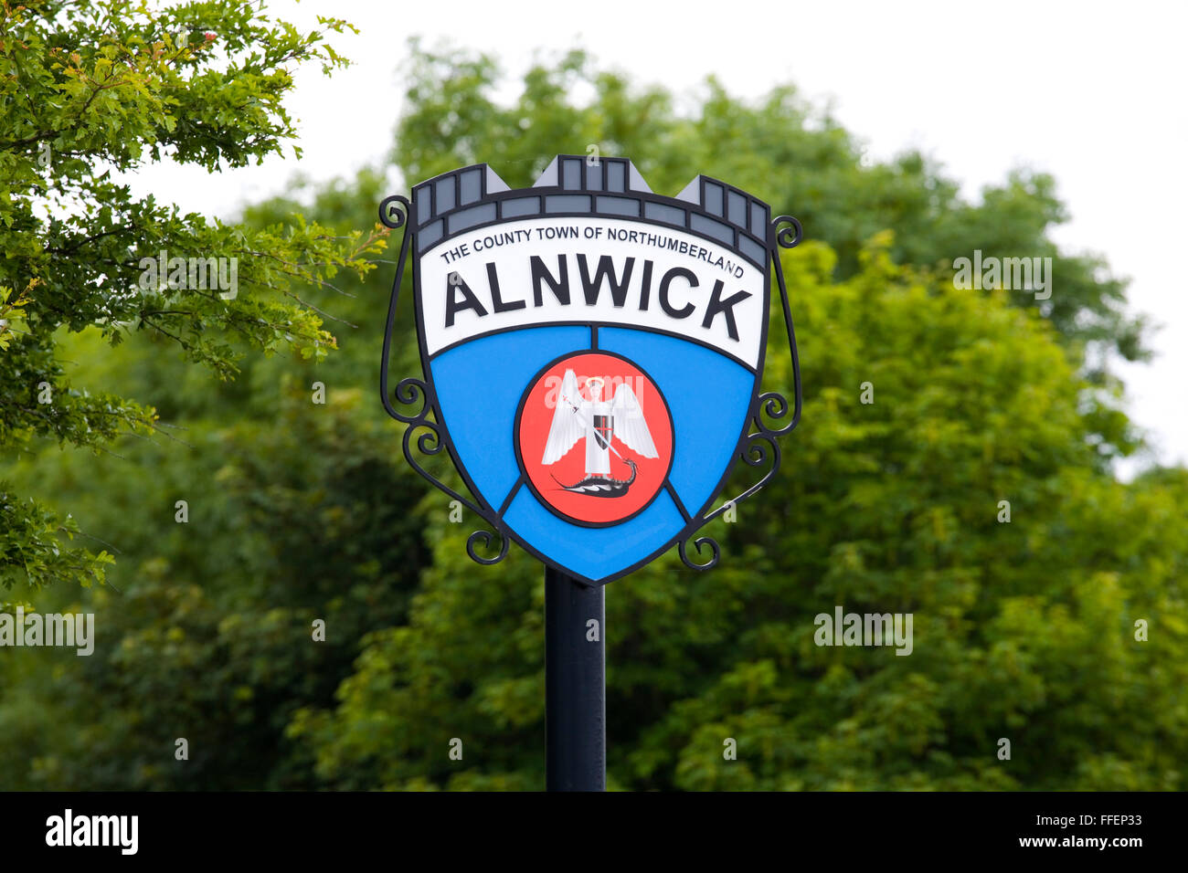 Alnwick, Northumberland, England. Sign at entrance to the town depicting an angel slaying a dragon. Stock Photo