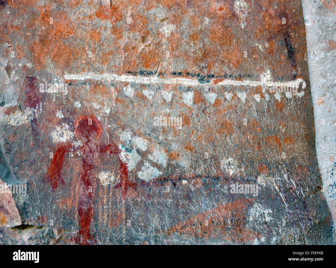 Rock art Pictograph image drawn or painted on rock face, suggest hunting scenses, religious ceremony. Sinagua. Hopi tribe. Stock Photo