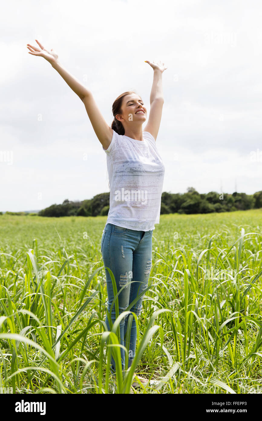 beautiful carefree young girl arms open in sugarcane field Stock Photo ...