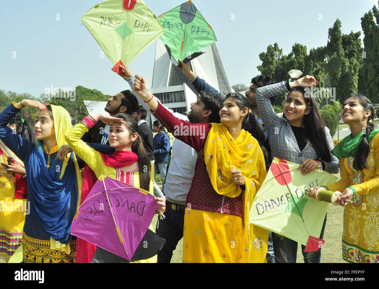 Patalia, India. 12th Feb, 2016. Girls dressed in yellow take part in Kite flying on the occasion of Basant Panchami Festival at Punjabi University. Basant Panchami is a Hindu festival which signifies the arrival of the spring season. Hindu deity, Goddess Saraswati who is considered to be the source of knowledge, education, culture, art and music in India, takes the major focus of attention on this auspicious day. This festival also mark the start of Holy season. © Rajesh Sachar/Pacific Press/Alamy Live News Stock Photo
