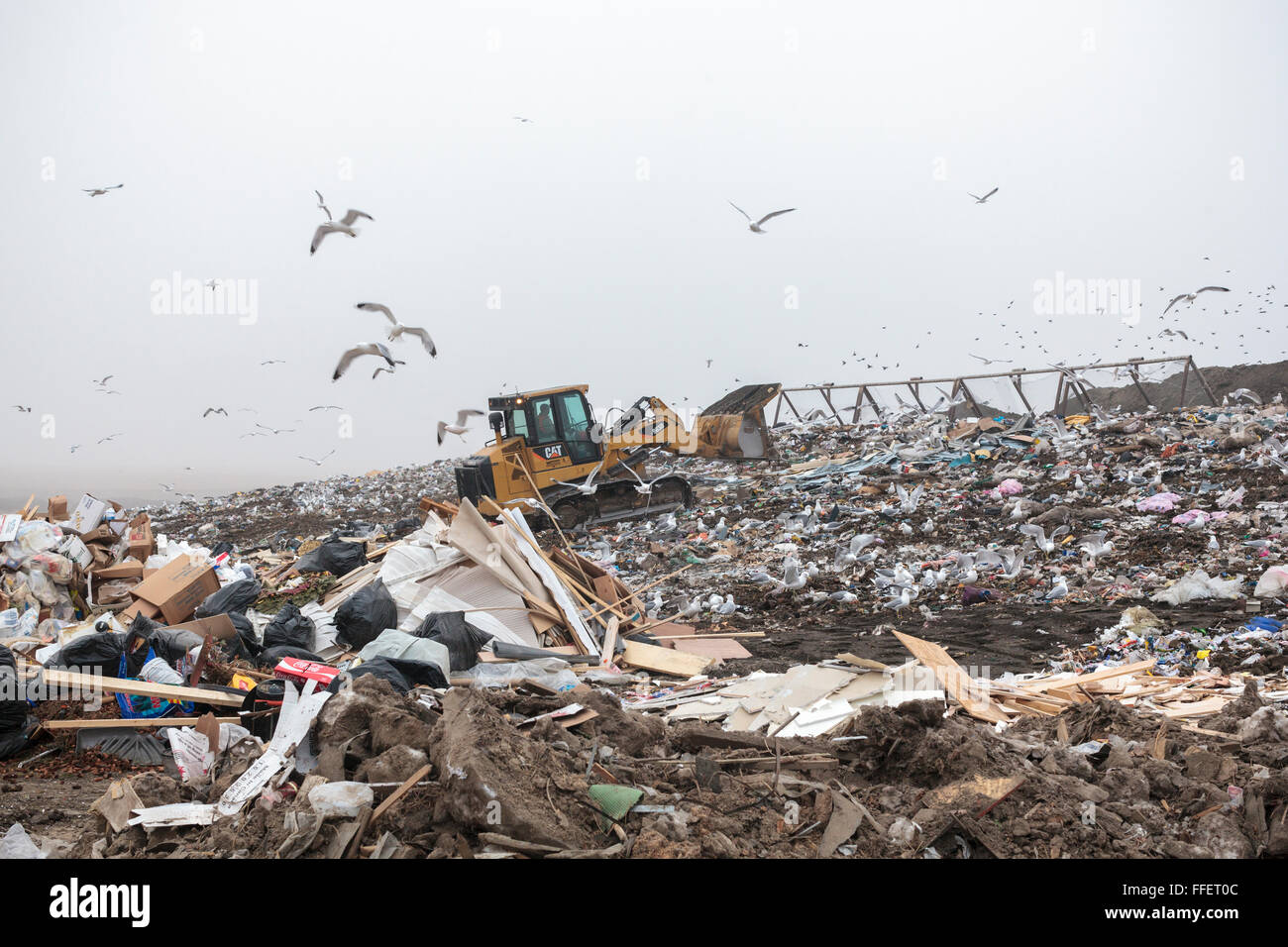 Garbage is processed and waste piled at a Calgary Regional Landfill in