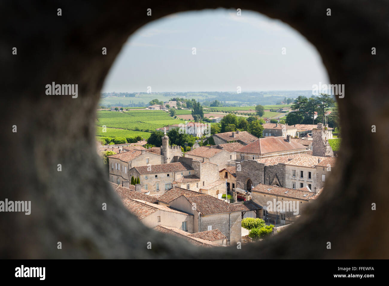 Buildings of Saint-Emilion viewed through hole in bell tower, Saint Emilion, Gironde, Aquitaine, France Stock Photo