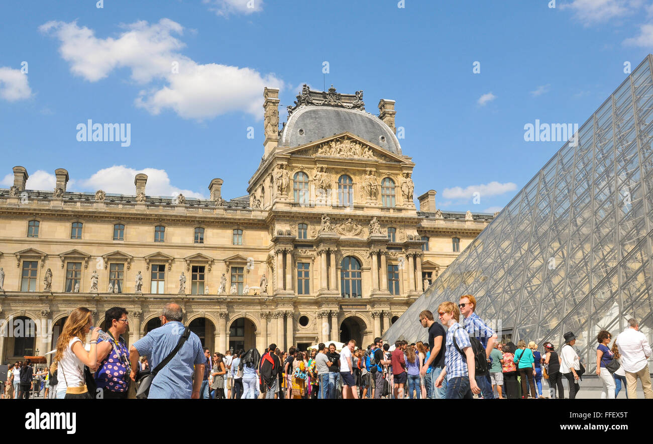 paris france july 9 2015 tourists visit the famous louvre stock