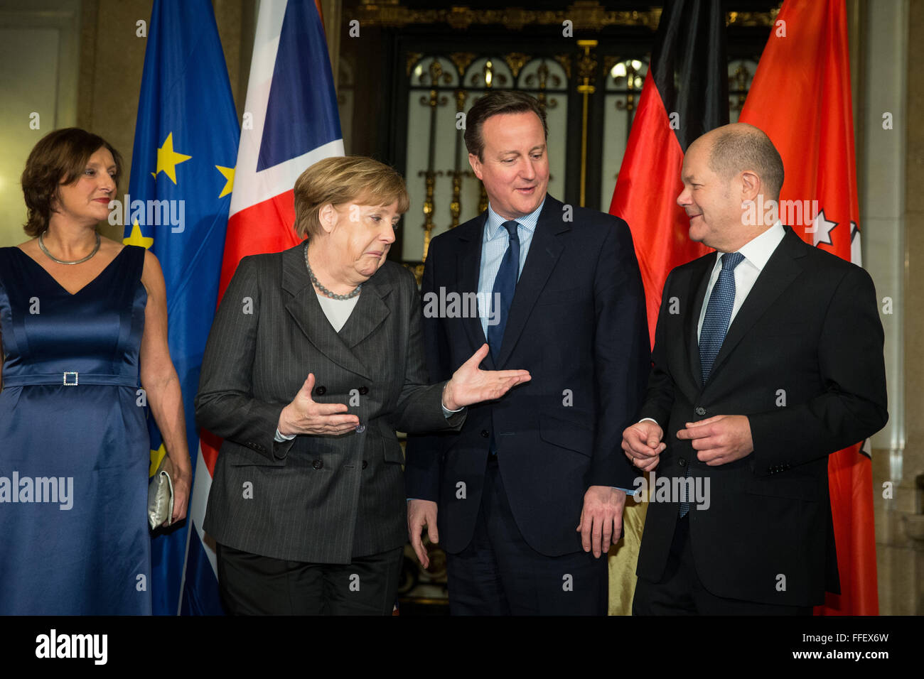 Hamburg, Germany. 12th Feb, 2016. Chancellor Angela Merkel (CDU, 2nd l), British Premier David Cameron (2nd r), Mayor of Hamburg Olaf Scholz (SPD, r) and his wife Britta Ernst (l) together at the city hall of Hamburg, Germany, 12 February 2016. Merkel and Cameron are guests of honour at the oldest feast in the world. Since 1356, the governance of the Hanse city invites to the Matthiae dinner. PHOTO: CHRISTIAN CHARISIUS/dpa/Alamy Live News Stock Photo