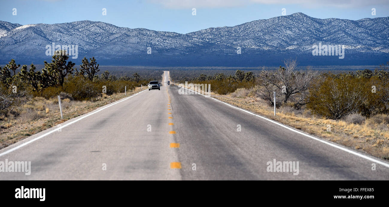 Searchlight, Nevada USA. 12th Feb, 2016. Motorist travel along Nipton