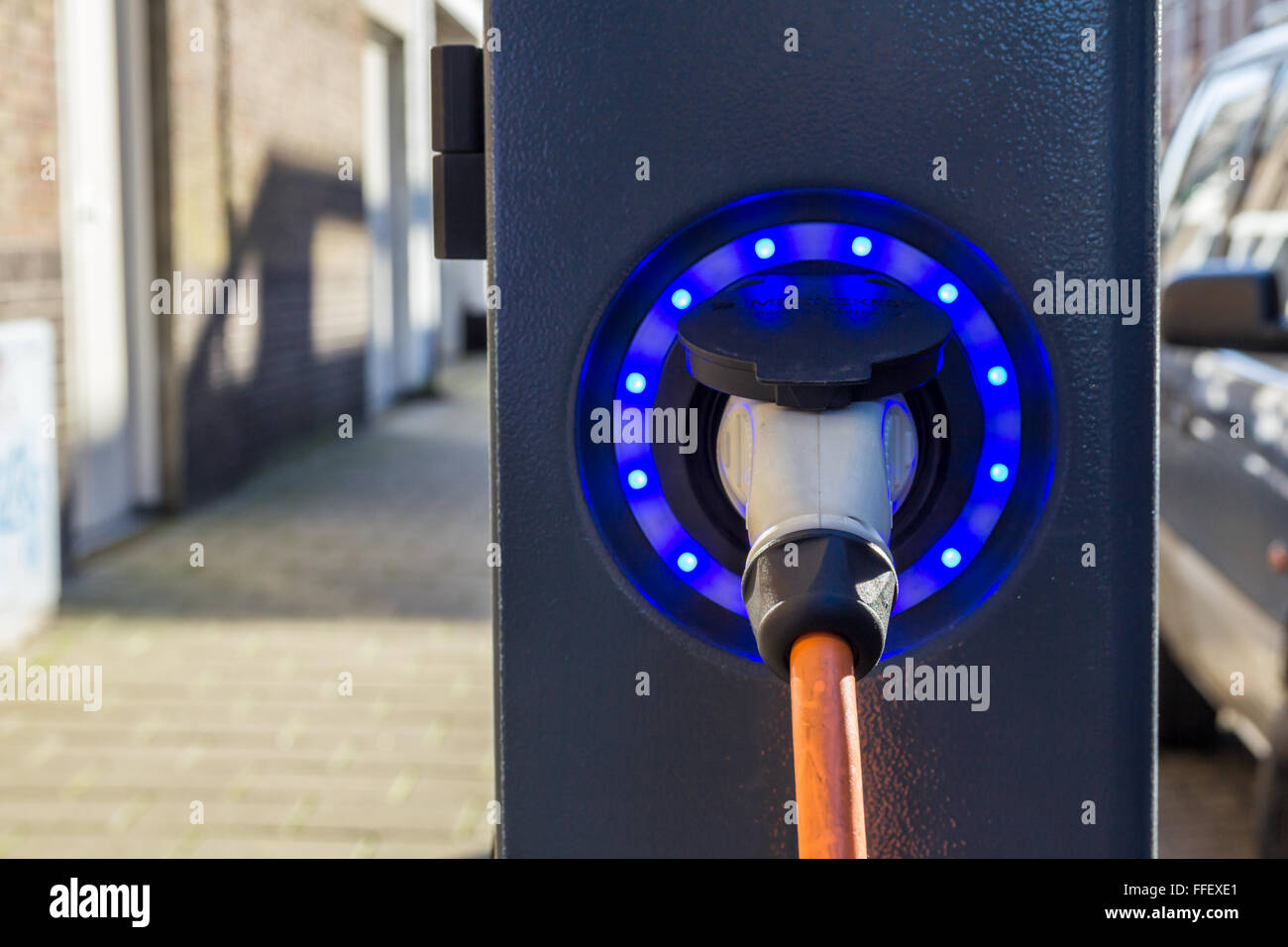 Plug in hybrid electric car charge point Stock Photo Alamy