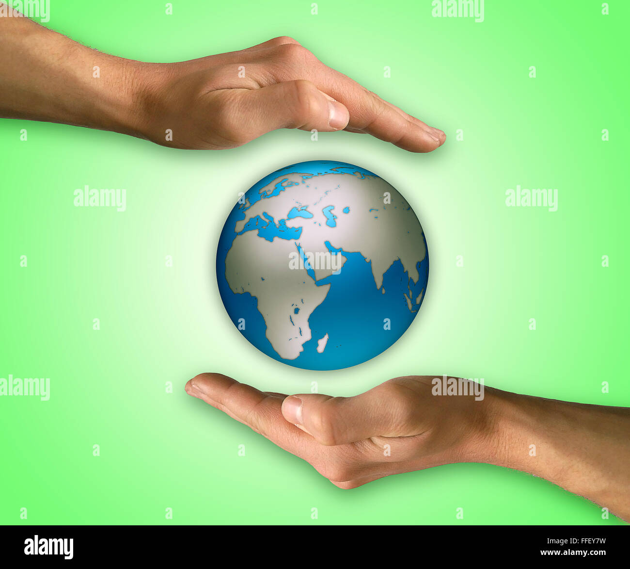Two hands in position to protect Earth. Protection and conservation concept Stock Photo