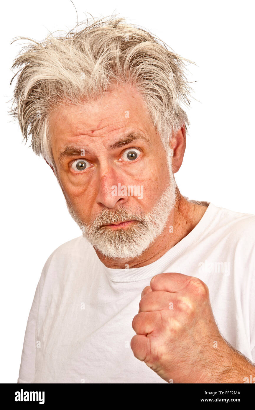 Disturbed Old Man Gesturing With Fist Stock Photo