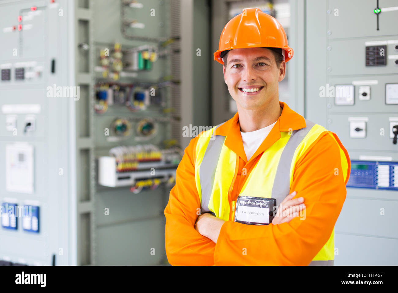 happy electrical engineer standing in control room Stock Photo Alamy