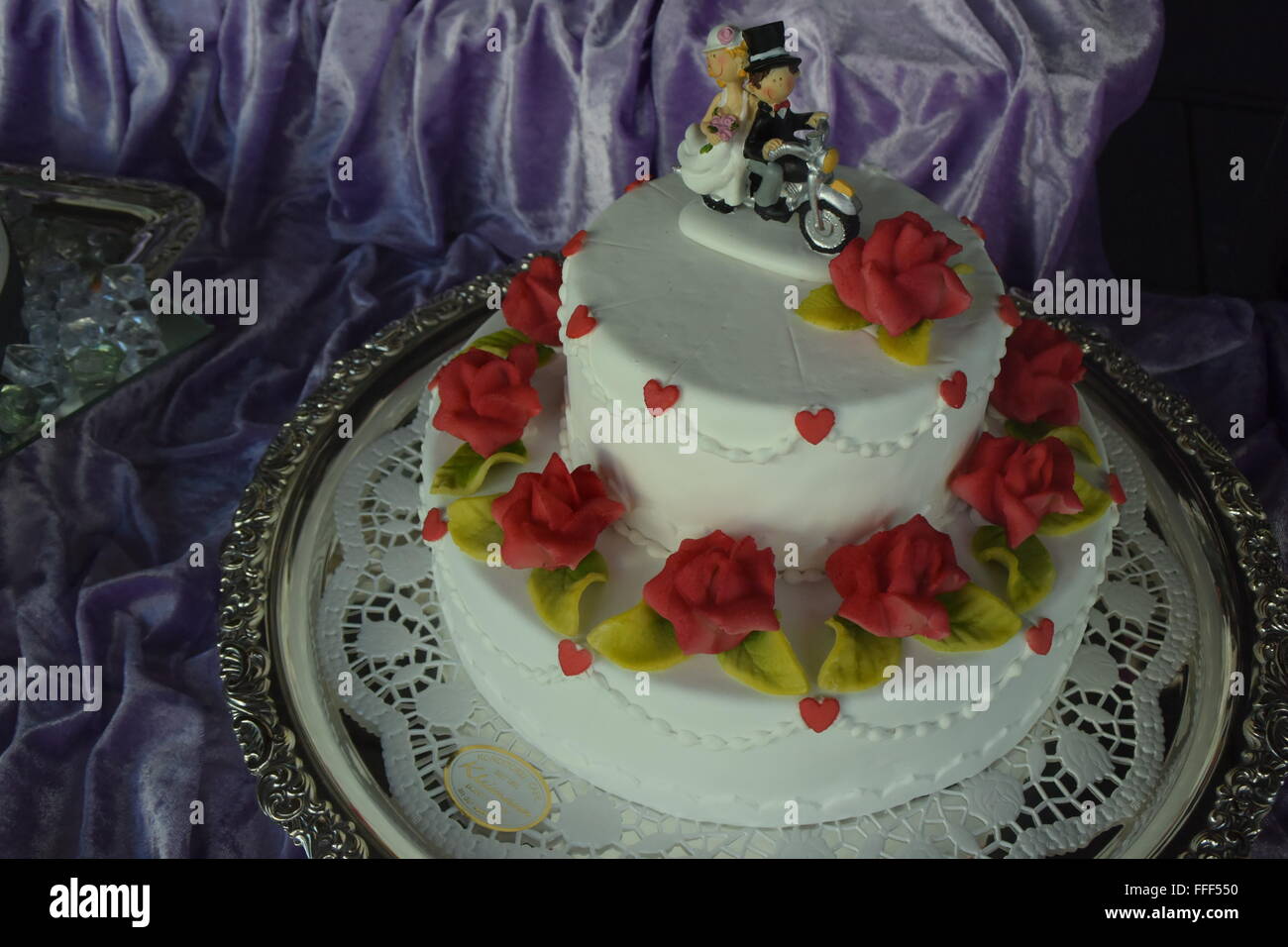 a wedding cake on a plate Stock Photo