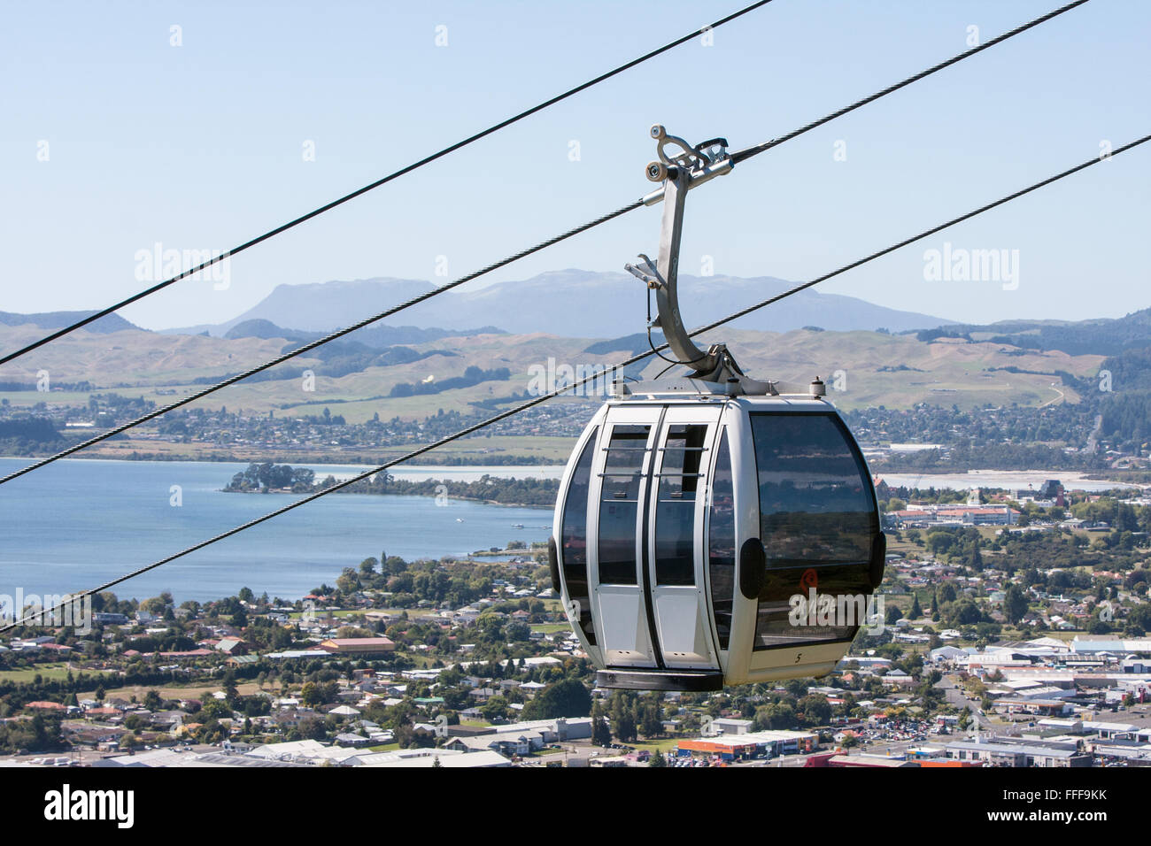Skyline Gondola cable car cableway ride to peak at Rotorua,with views of Rotorua Lake and town,North Island,New Zealand. Stock Photo