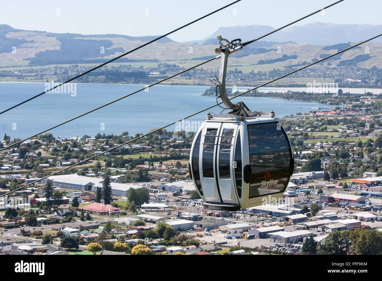 Skyline Gondola cable car cableway ride to peak at Rotorua,with views of Rotorua Lake and town,North Island,New Zealand. Stock Photo