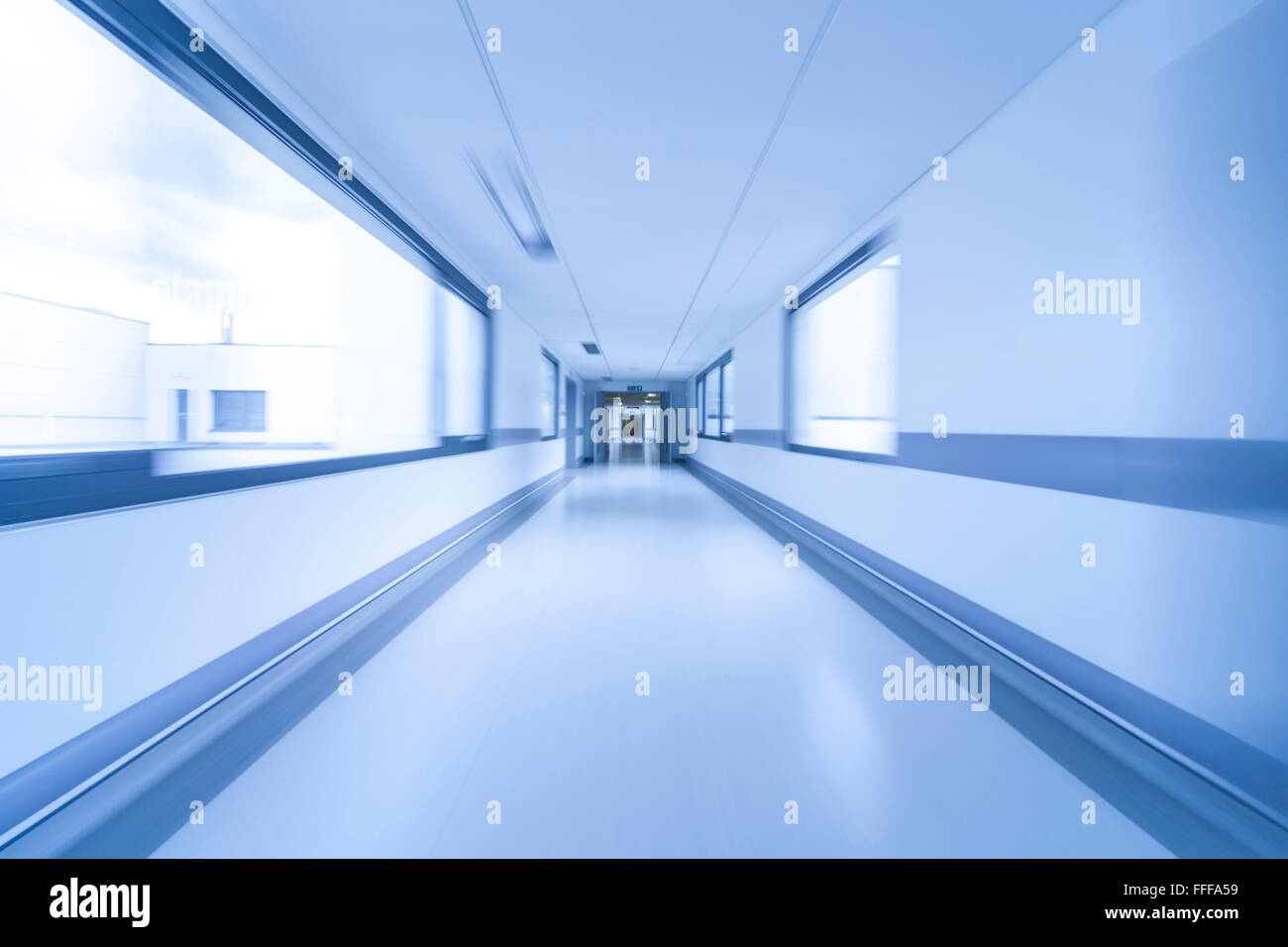 A motion blurred photograph of an empty hospital corridor Stock Photo