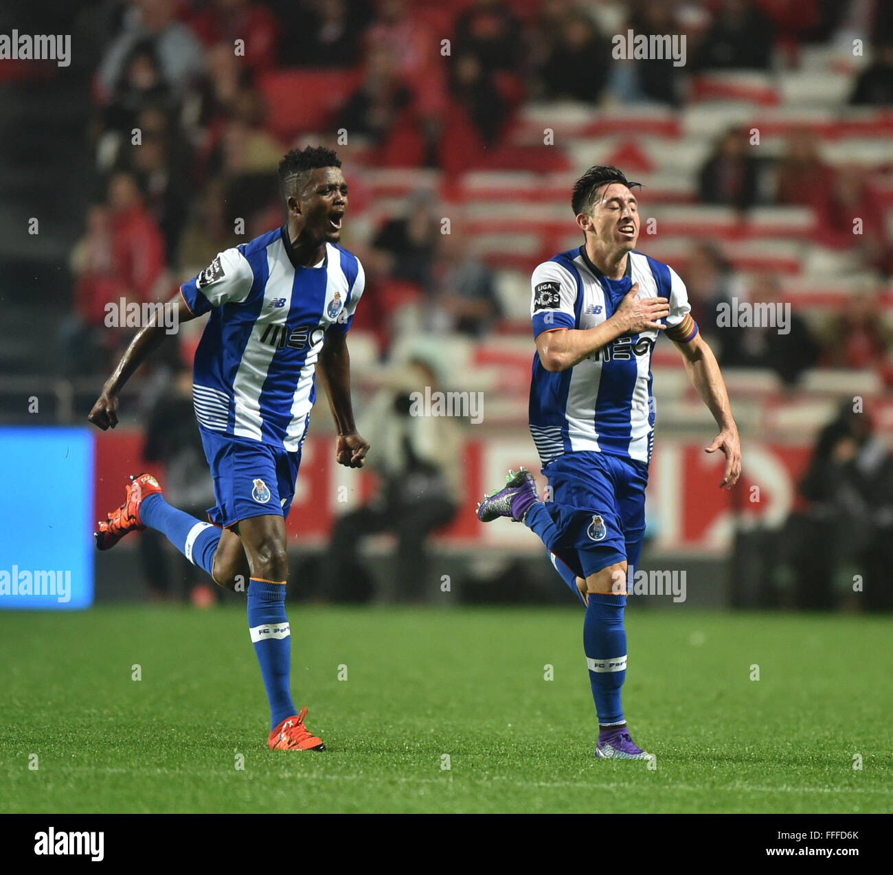 Lisbon, Portugal. 12th Feb, 2016. Porto's Hector Herrera (R) celebrates after scoring during the Portuguese league soccer match between SL Benfica and FC Porto at the Luz stadium in Lisbon, Portugal, on Feb. 12, 2016. Benfica lost 1-2. Credit:  Zhang Liyun/Xinhua/Alamy Live News Stock Photo
