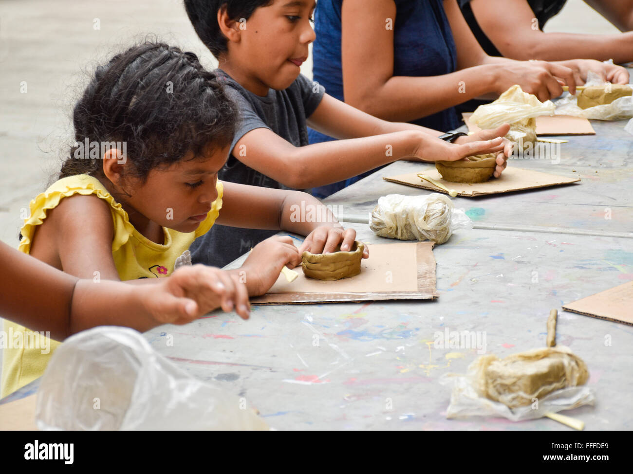 Children making art projects at a local government cultural event in Acapulco, Mexico. Stock Photo