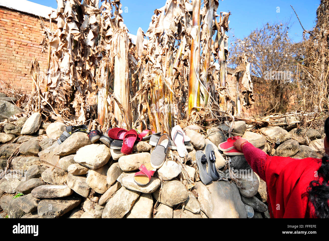 Kathmandu, Nepal. 12th Feb, 2016. Devotees put their belongings to a safe place to take bless