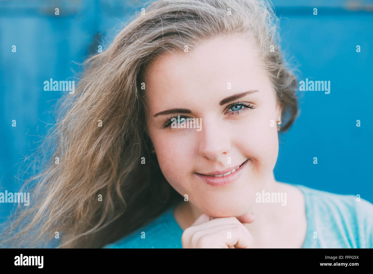 Close up Of Attractive Plus Size Young Woman. Girl smiling and looking at the camera Stock Photo