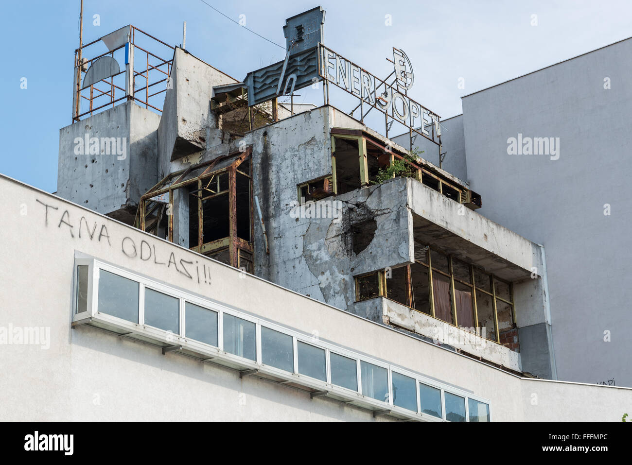 War scars on building at Brace Fejica pedestrian street in Mostar city, Bosnia and Herzegovina Stock Photo