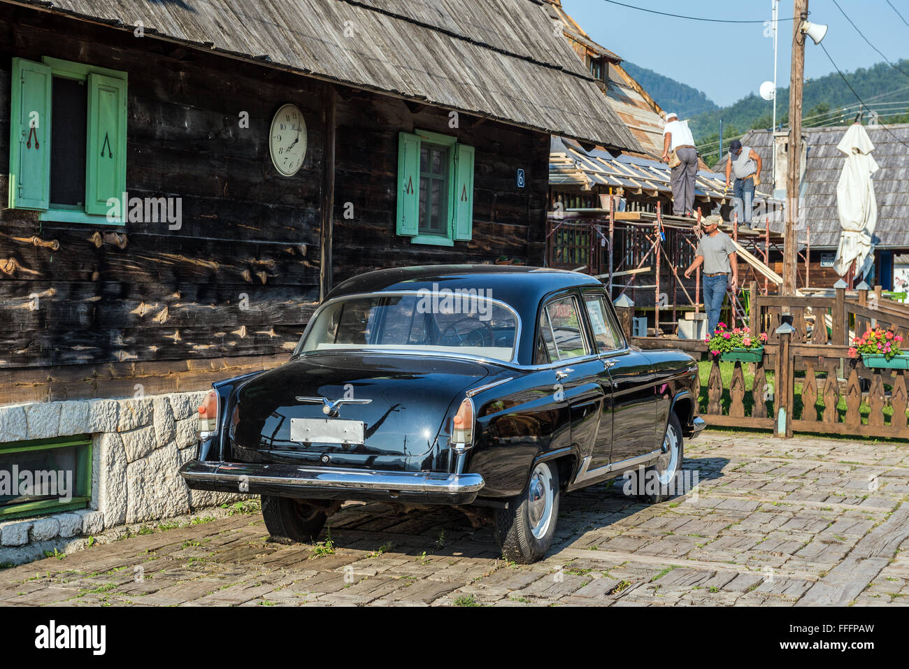 GAZ M21 Volga car (Third Series) in front of Main House of Drvengrad village (Kustendorf) built by Emir Kusturica, Serbia Stock Photo