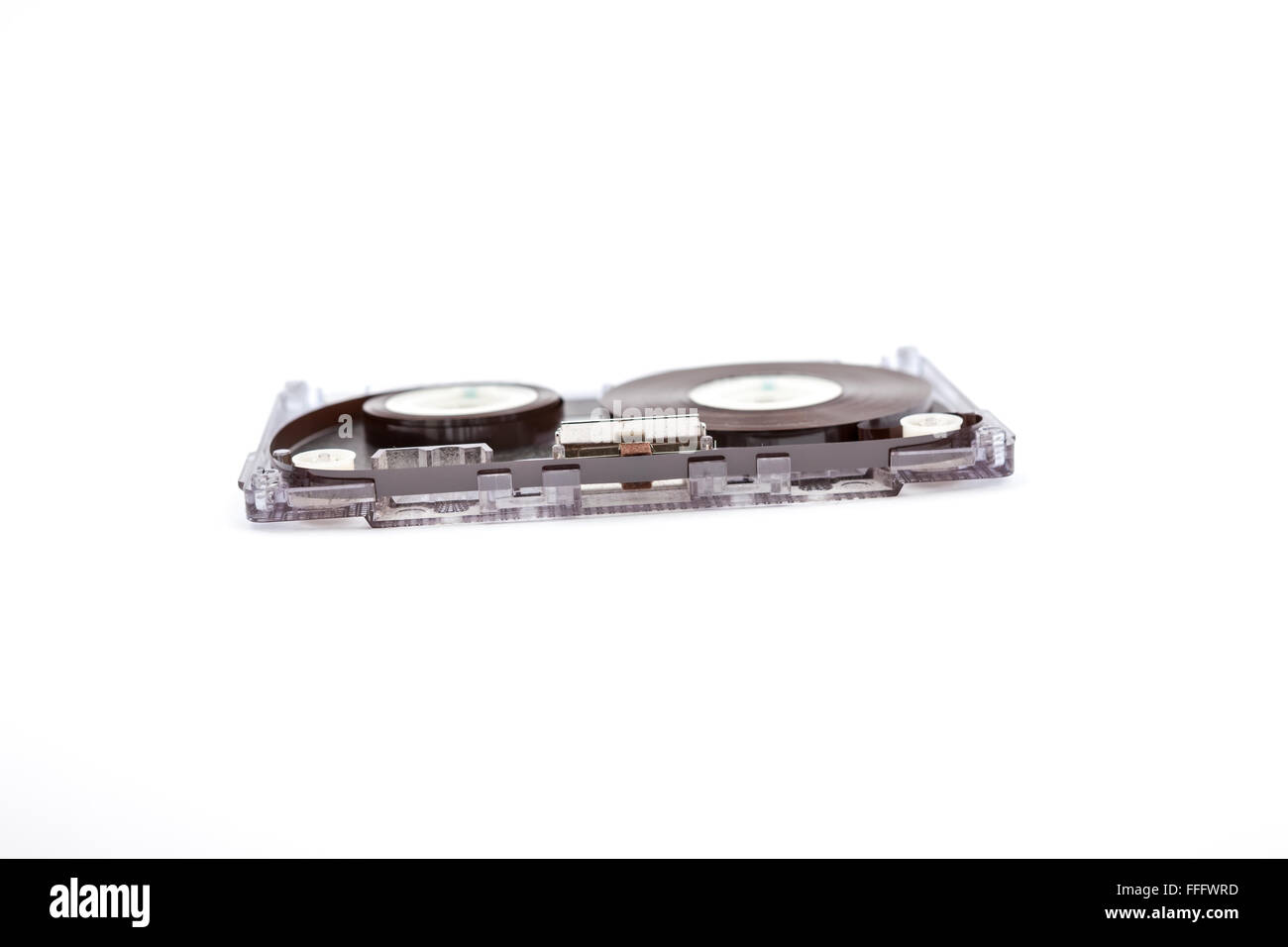 unrolled music cassette on an white background Stock Photo