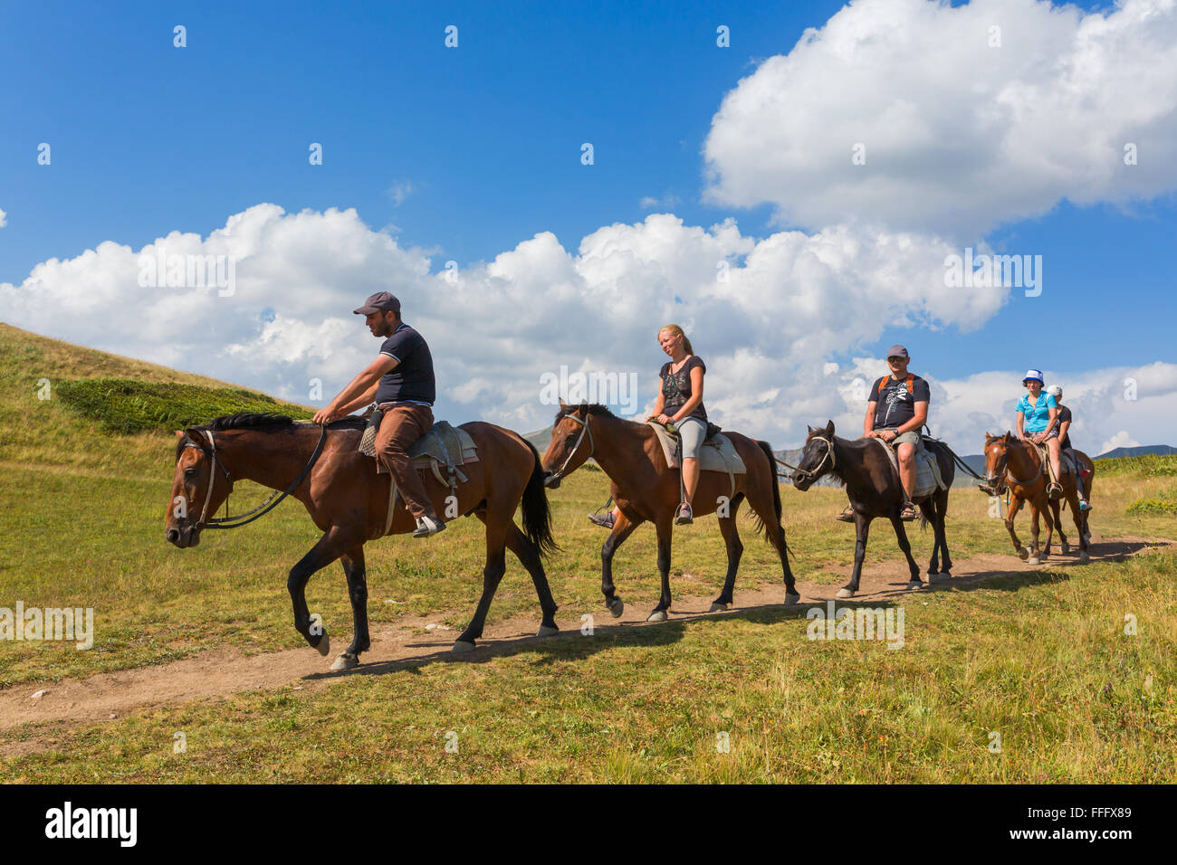 Horseback riding, Valley of seven lakes, Caucasus mountains, Abkhazia, Georgia Stock Photo