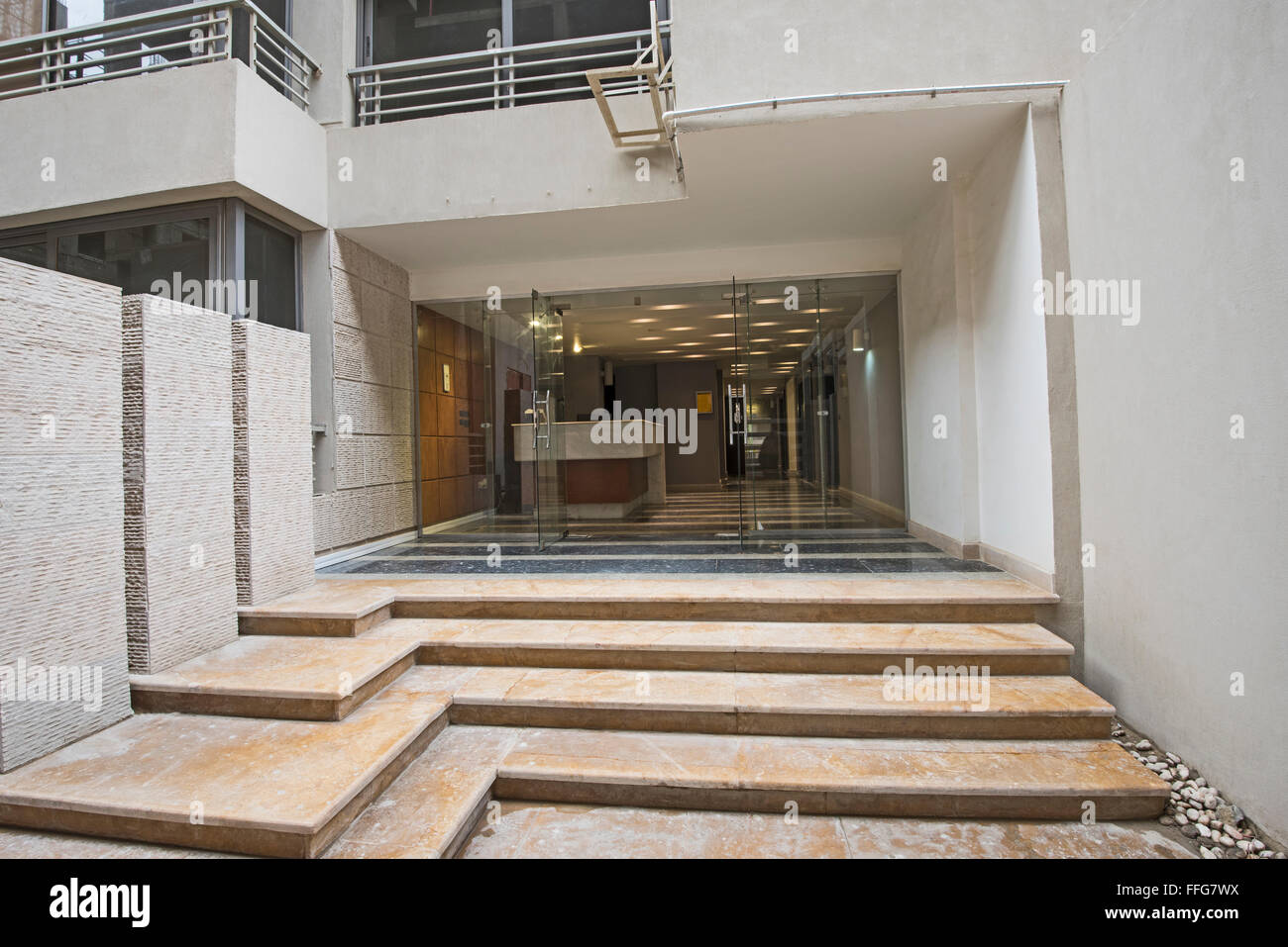 Entrance door and steps to a modern luxury apartment building Stock Photo