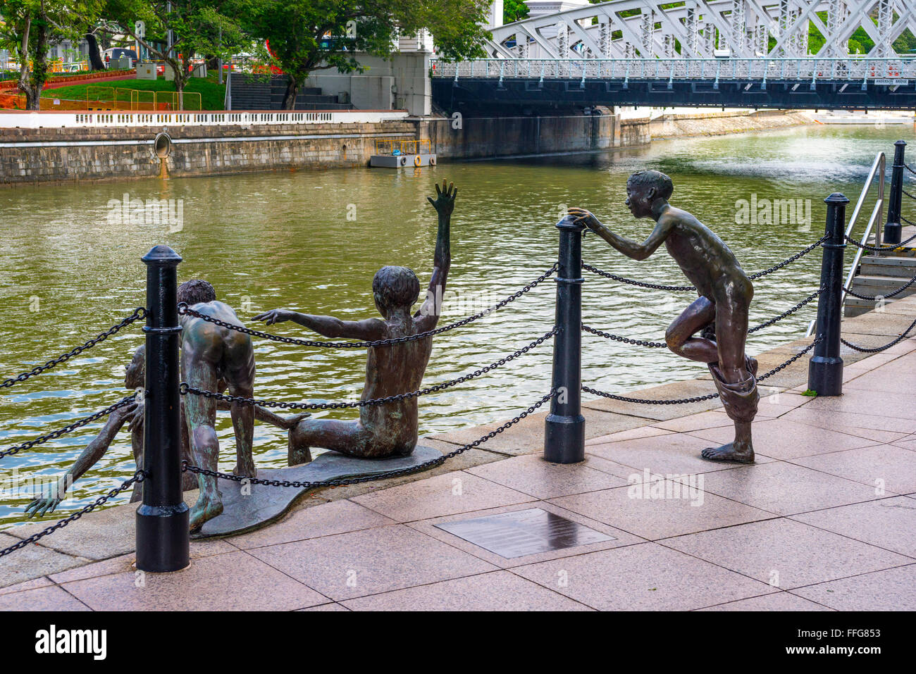 The First Generation, bronze sculpture beside the Singapore River, Singapore Stock Photo