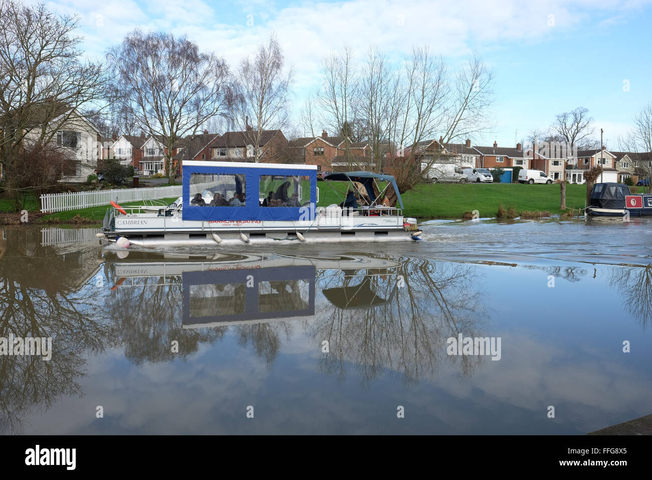 people travelling on a boat along the river soar at barrow at soar