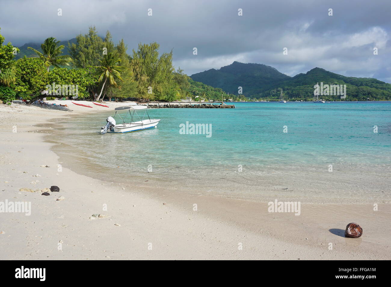 White sand beach near the village of Fare in Huahine island, Pacific ocean, French Polynesia Stock Photo