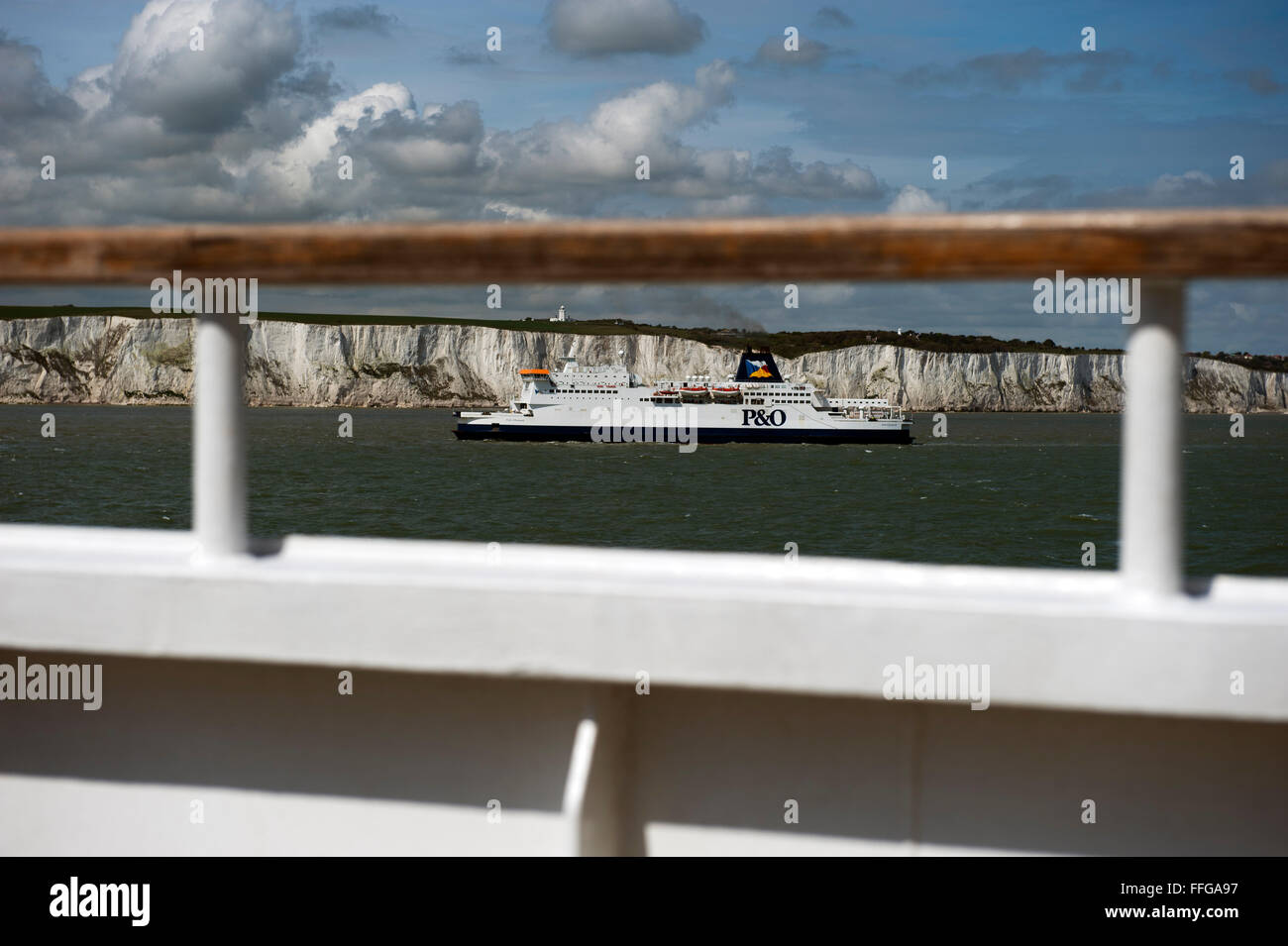View from deck of a ferry boat to P&O Ferry  on the North Sea, passing the white chalk cliffs of Dover along the English Channel Stock Photo