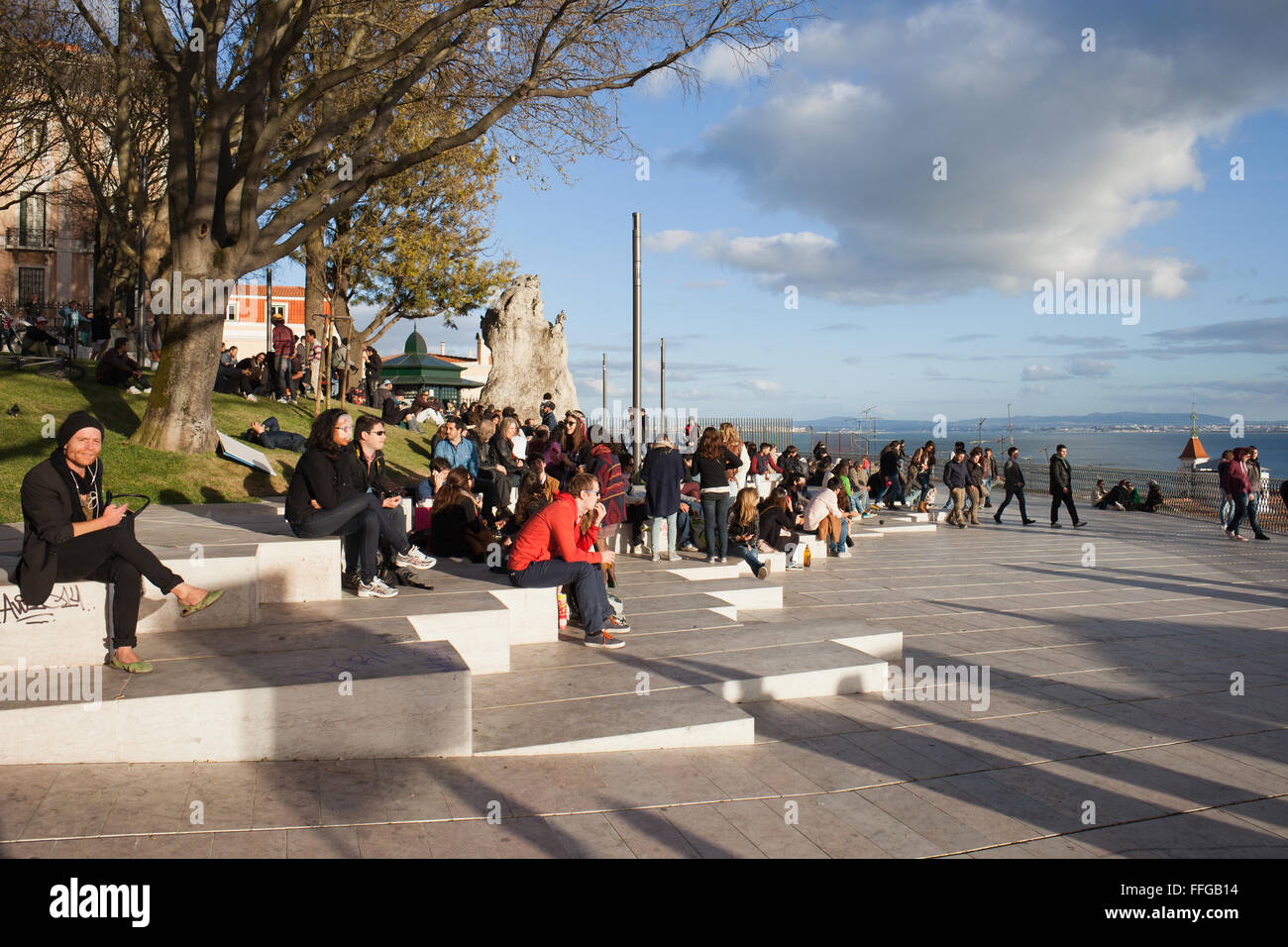 Portugal, city of Lisbon, people hangout at Miradouro de Santa Catarina terrace and garden Stock Photo