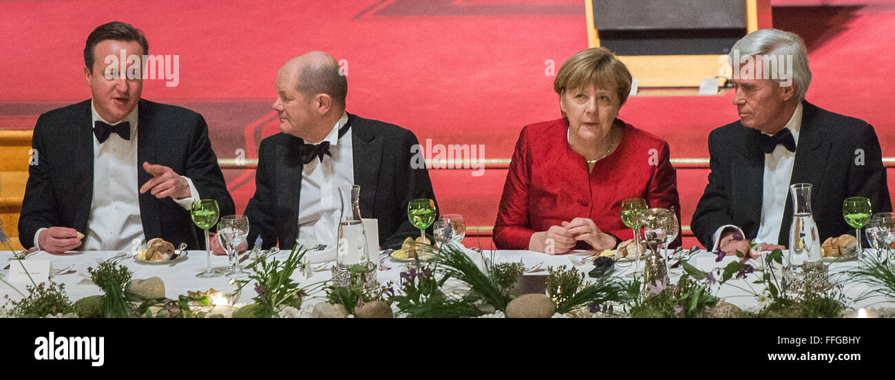 Hamburg, Germany. 12th Feb, 2016. Britain's Prime Minister David Cameron (L-R), Hamburg's First Mayor Olaf Scholz, German Chancellor Angela Merkel and Michael Otto, former CEO of Otto Group, talk at the annual Matthiae dinner at the city hall of Hamburg, Germany, 12 February 2016. Britain's Prime Minister David Cameron and German Chancellor Angela Merkel are guests of honour at the oldest feast in the world. Since 1356, the leaders of the Hansa city invite distinguished guests to the Matthiae dinner. Photo: LUKAS SCHULZE/dpa/Alamy Live News Stock Photo