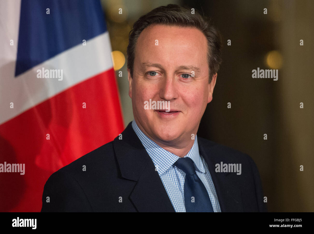 Hamburg, Germany. 12th Feb, 2016. Britain's Prime Minister David Cameron pictured in front of a British flag prior to the annual Matthiae dinner at the city hall of Hamburg, Germany, 12 February 2016. Britain's Prime Minister David Cameron and German Chancellor Angela Merkel are guests of honour at the oldest feast in the world. Since 1356, the leaders of the Hansa city invite distinguished guests to the Matthiae dinner. Photo: LUKAS SCHULZE/dpa/Alamy Live News Stock Photo