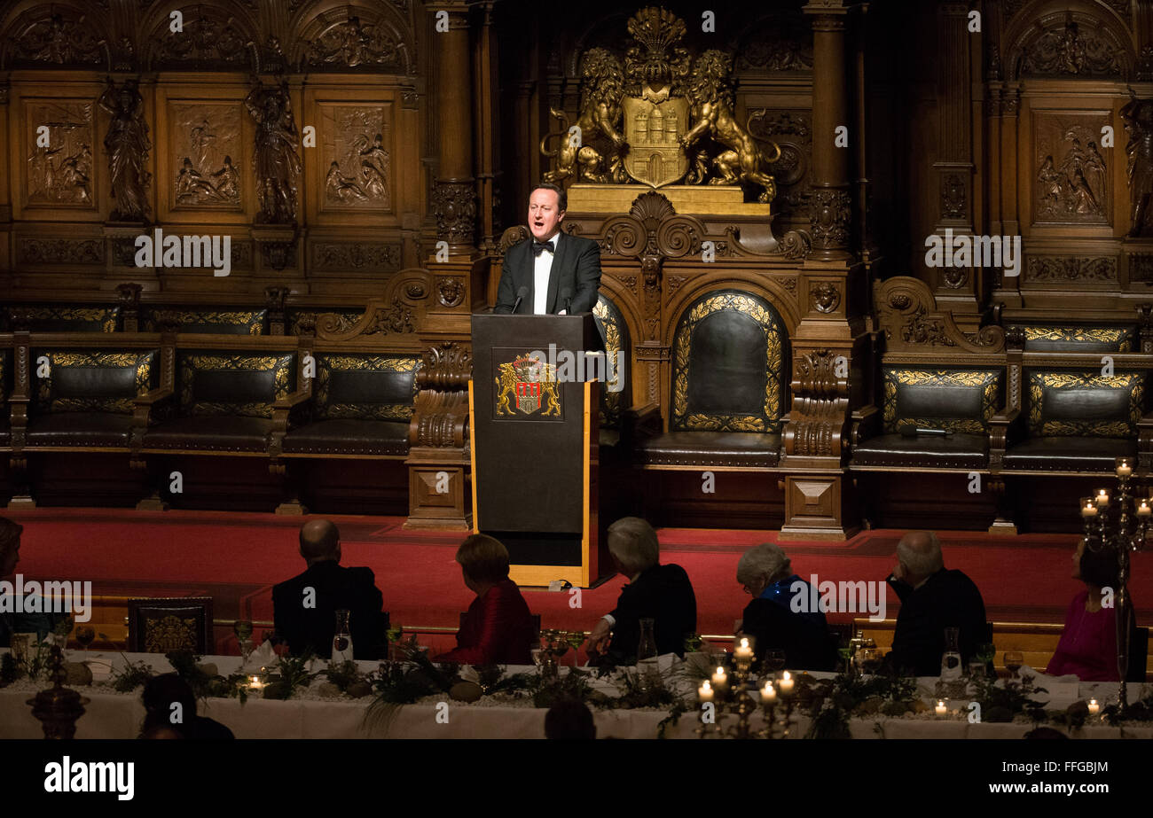 Hamburg, Germany. 12th Feb, 2016. Britain's Prime Minister David Cameron delivers a speech at the Matthiae dinner at the city hall of Hamburg, Germany, 12 February 2016. Britain's Prime Minister David Cameron and German Chancellor Angela Merkel are guests of honour at the oldest feast in the world. Since 1356, the leaders of the Hansa city invite distinguished guests to the Matthiae dinner. Photo: CHRISTIAN CHARISIUS/dpa/Alamy Live News Stock Photo
