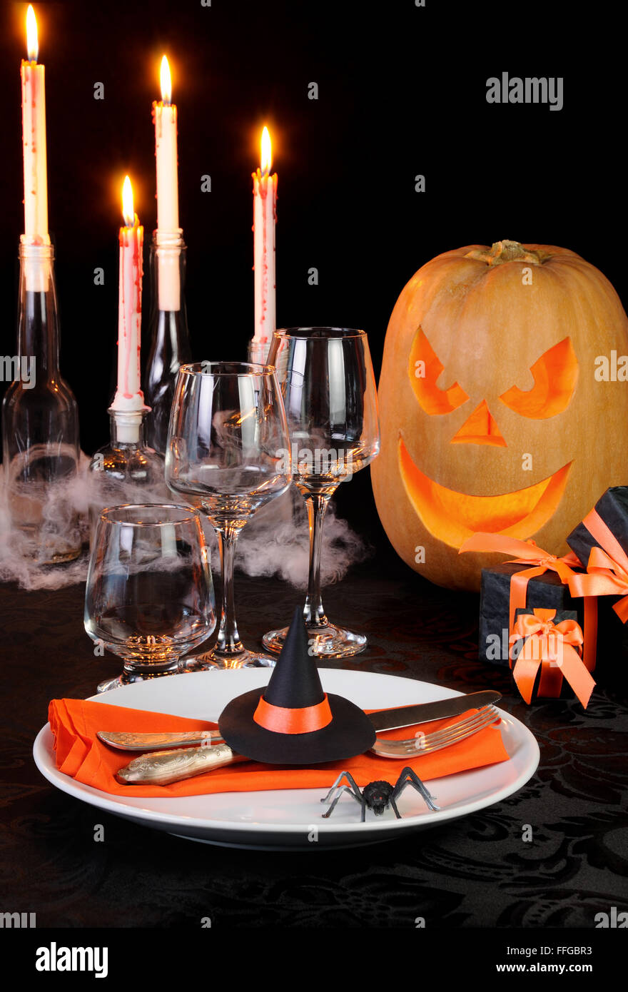 Witch's Hat as a decor element Halloween table setting Stock Photo