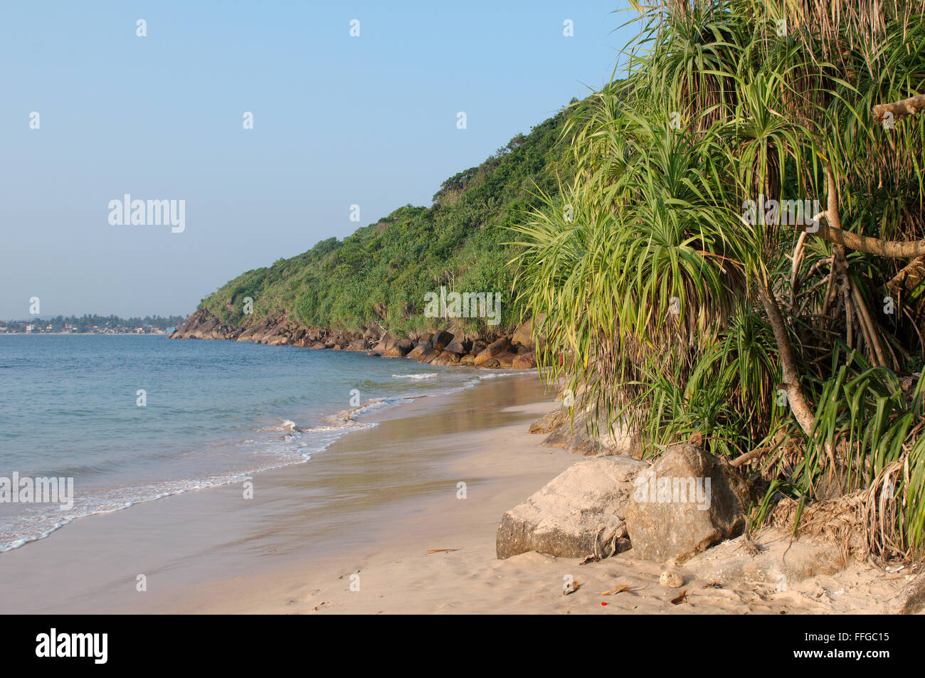 rocky shore on 'Jungle Beach', Hikkaduwa, Sri Lanka, South Asia Stock Photo